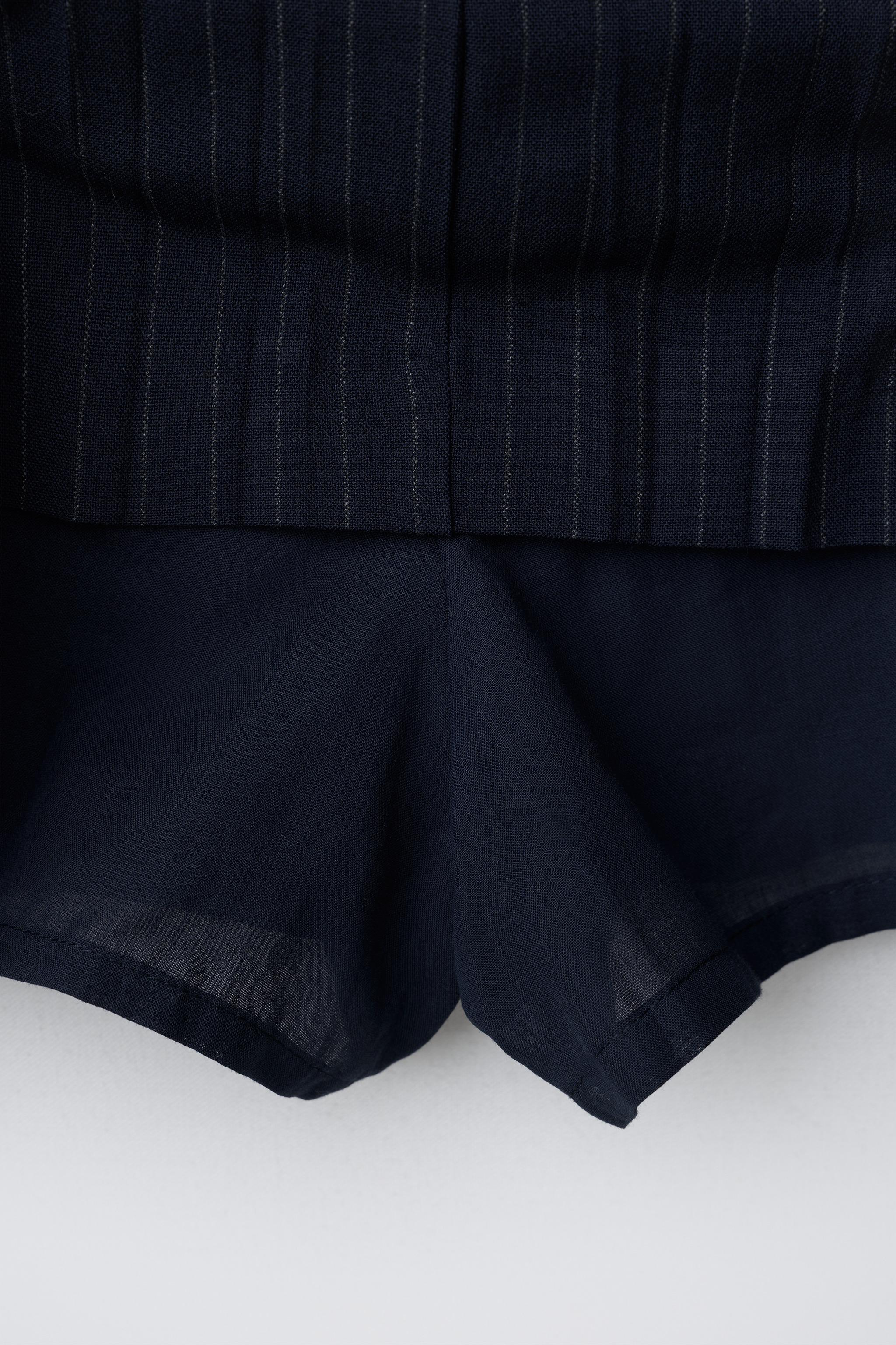 JUPE À RAYURES AVEC CEINTURE